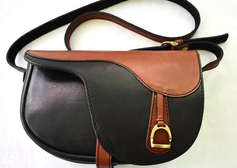 classic black and tan leather saddle purse