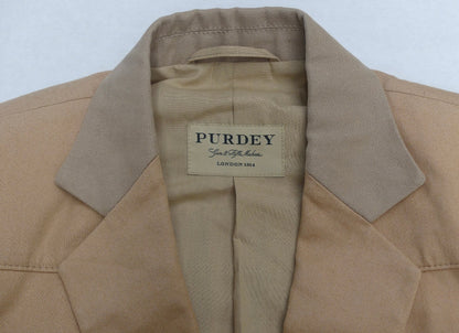 Close-up of a tan wool-blend blazer collar with a beige interior label reading 'PURDEY'.