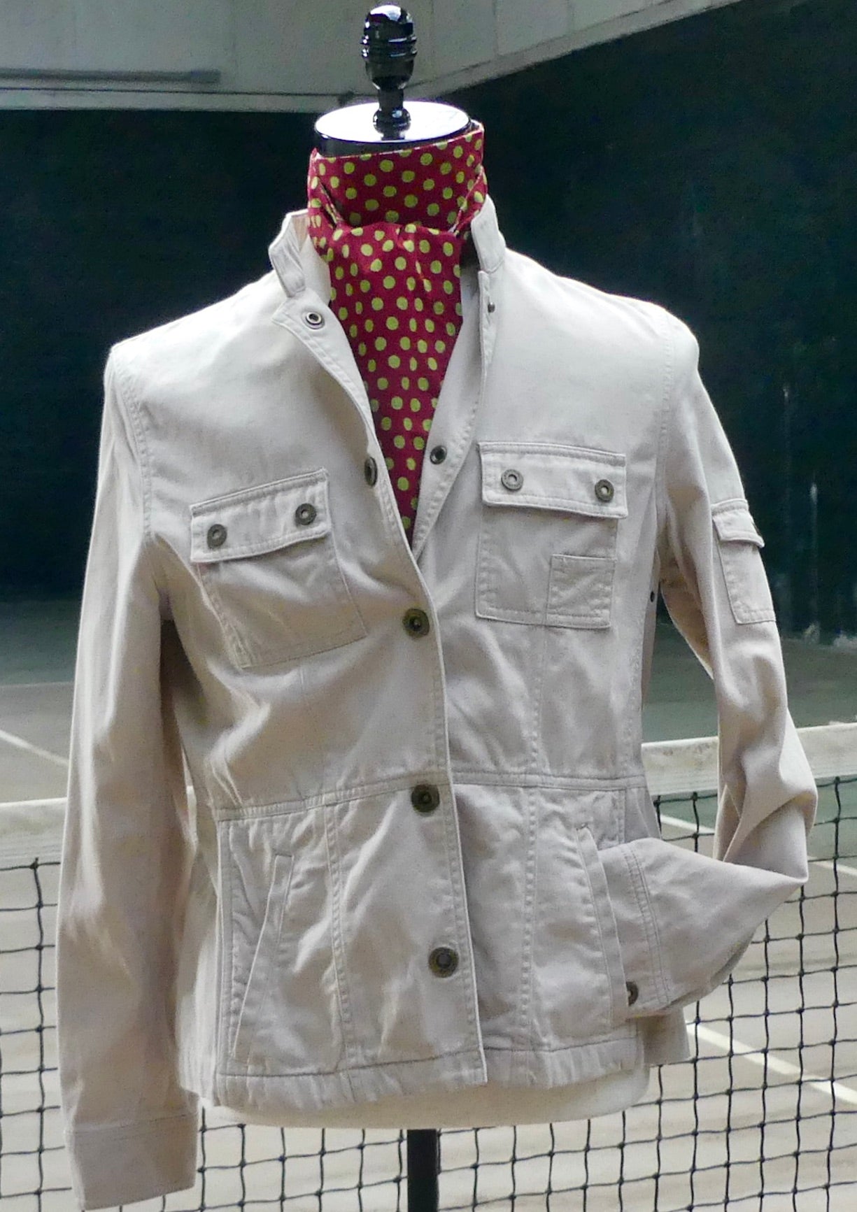 size medium women's khaki travel jacket with snap closures