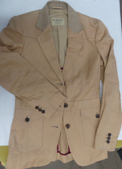 A tan wool-blend blazer jacket by Purdey London, featuring a structured collar, notched lapels, and dark brown buttons, laid flat against a white background.